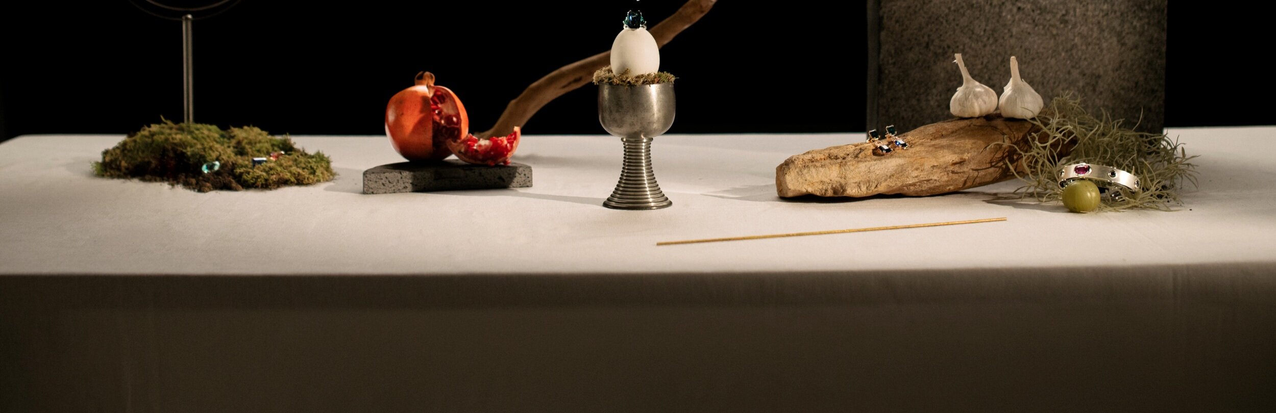 Gemstones and jewelry displayed as a still life